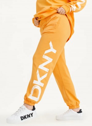 Yellow Women's Dkny Pigment Dye Distressed Crackle Logo Jogger Pants | 083YSLODP
